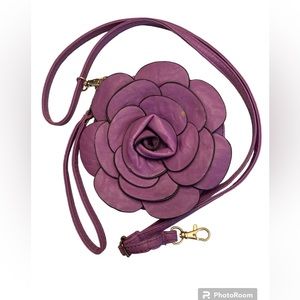 NWOT Purple faux leather flower convertible wristlet/shoulder bag.